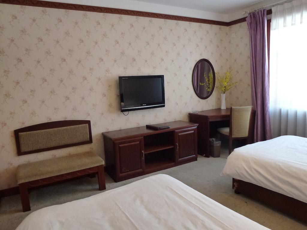 Отель Harbin Volgamanor Acheng Номер фото